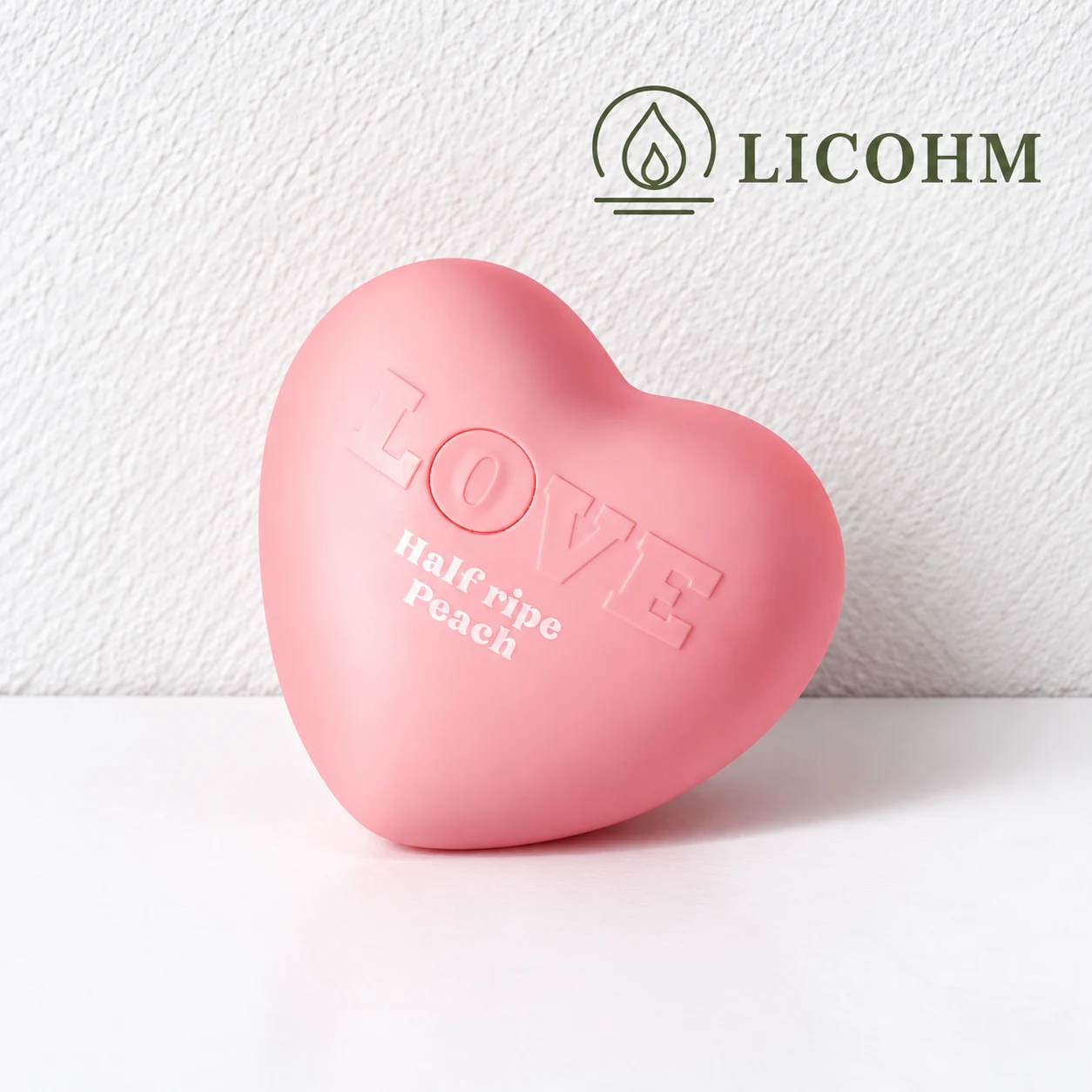 LICOHM Heart Fragrance Ornament - Sculpted Case and Raised Lettering Detail